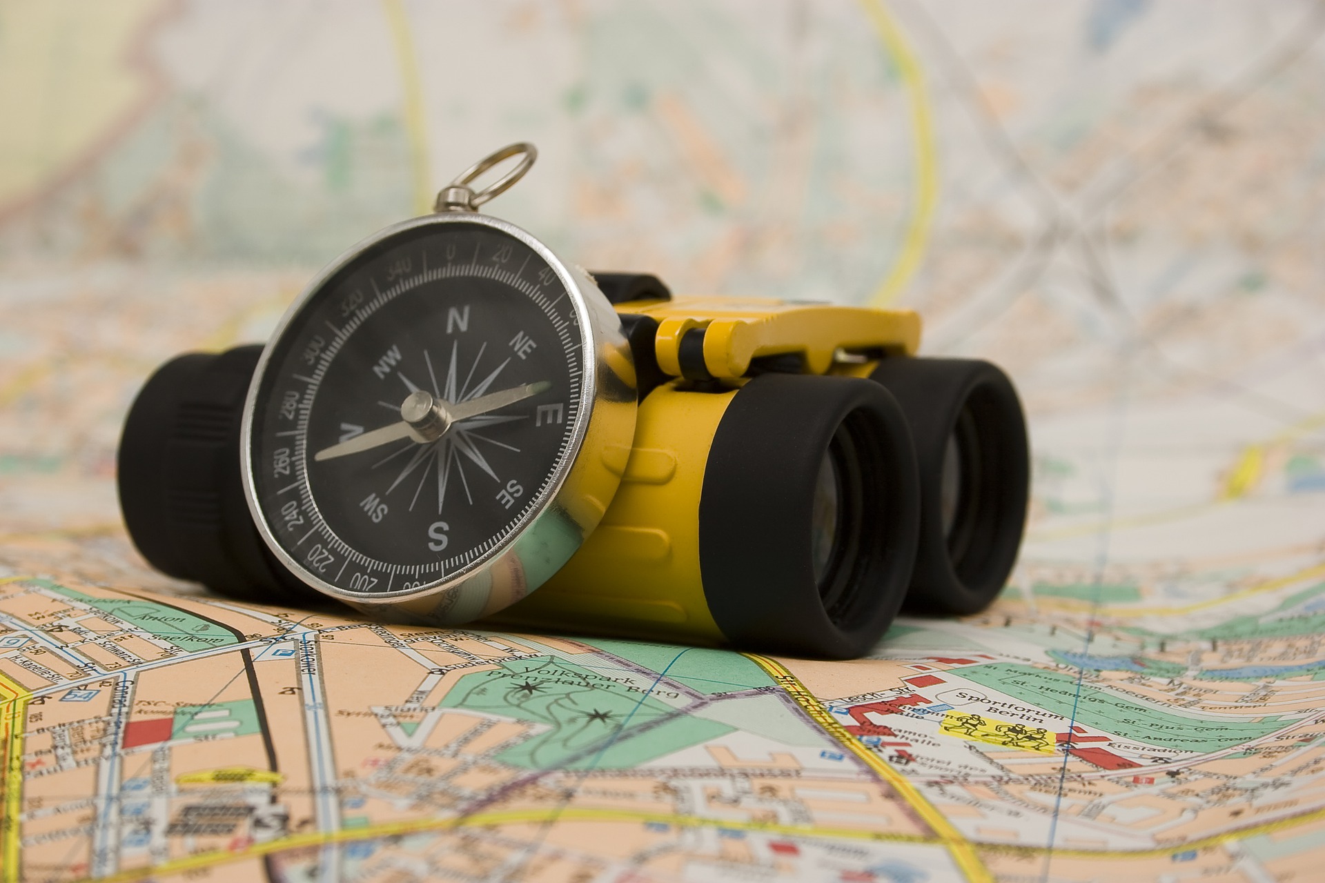 Binoculars, map and compass