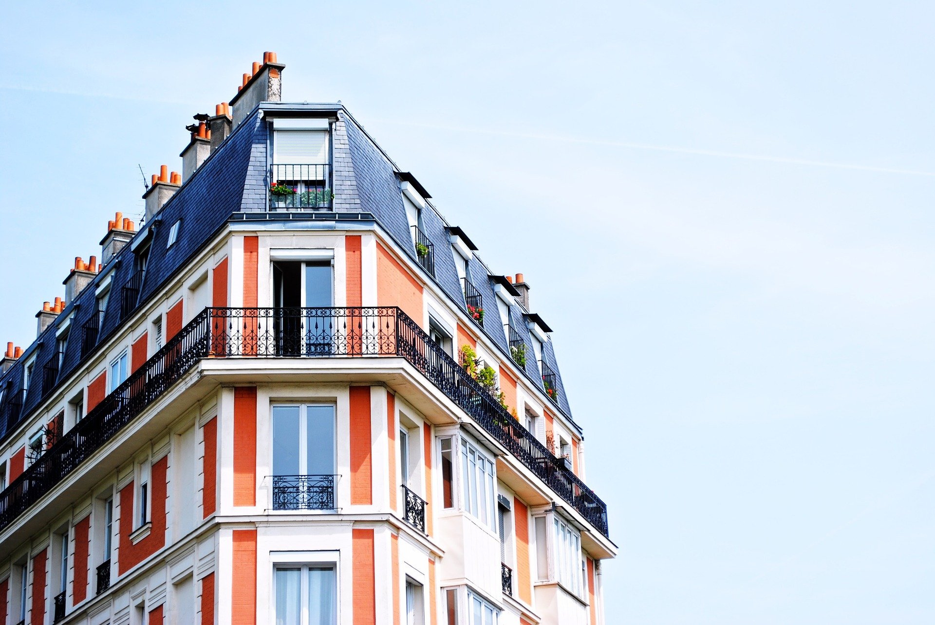 colourful building containing flats and balconies