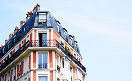 colourful building containing flats and balconies