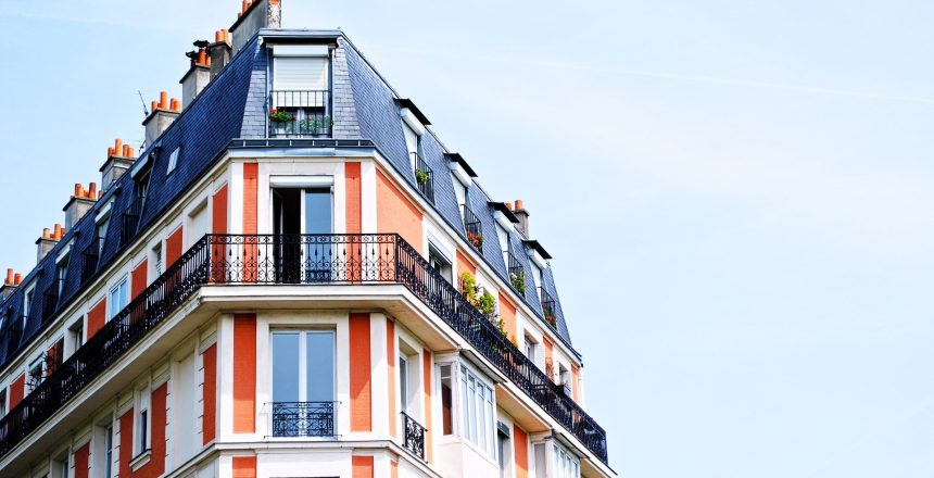 colourful building containing flats and balconies